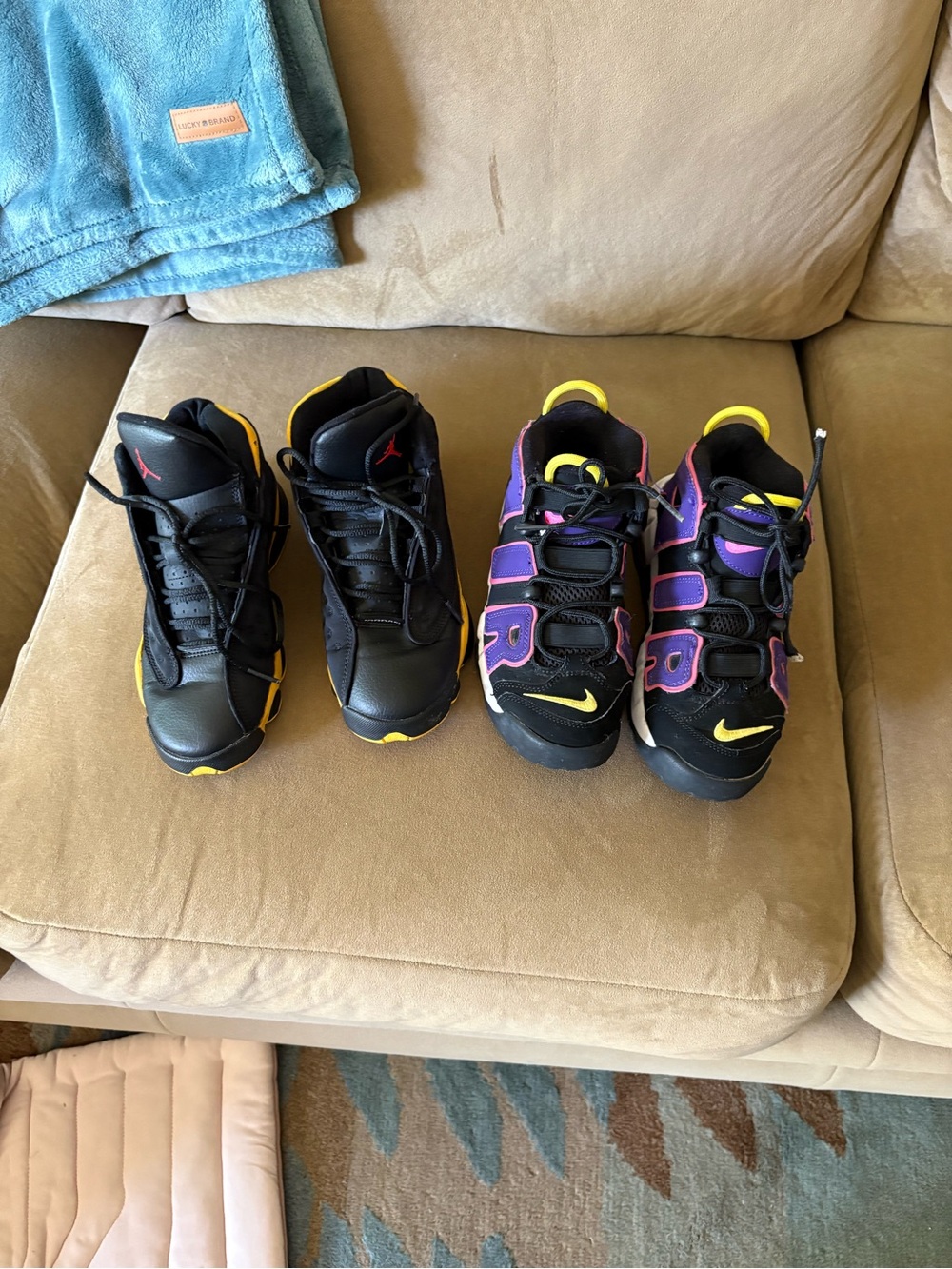 2 pair of Nike sneakers 1) black and purple size 4Y 2) black and yellow size 4Y